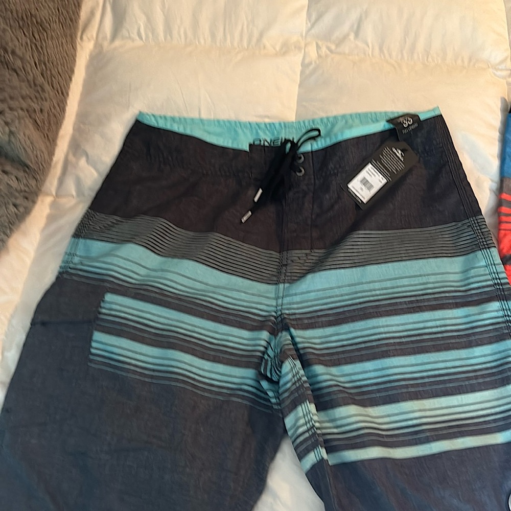 Men’s O’Neill swim trunks size 33.